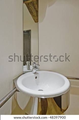 modern designer hand wash basin with mirror