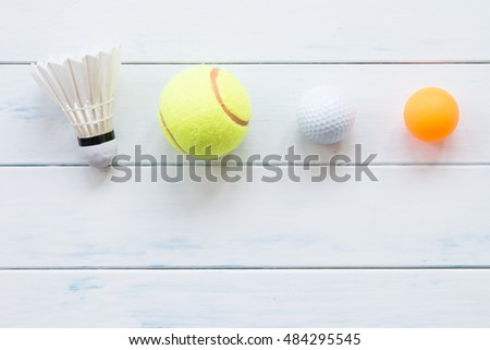 Tennis on white wood