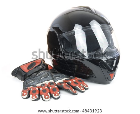 Black, shiny motorcycle helmet and leather biker gloves Isolated on white background