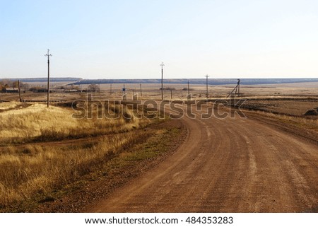 Ground road in the countryside. Autumn