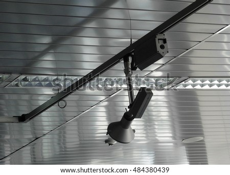 Roof spotlight on rail system in video studio stock photo