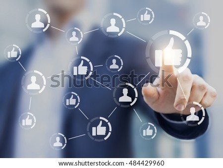 Person touching buttons connected together. Concept of marketing, reputation management and social media networking Royalty-Free Stock Photo #484429960