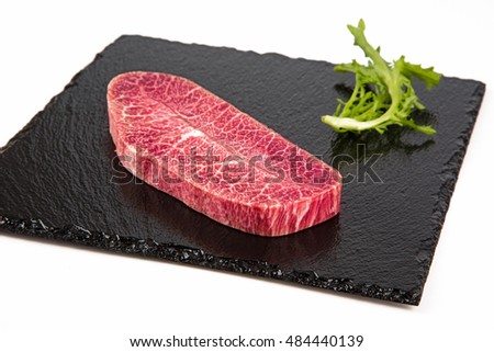 Close-up view of Australia wagyu oyster blade on white background. Royalty-Free Stock Photo #484440139
