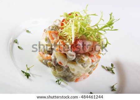 Russian salad with Bacon on plate