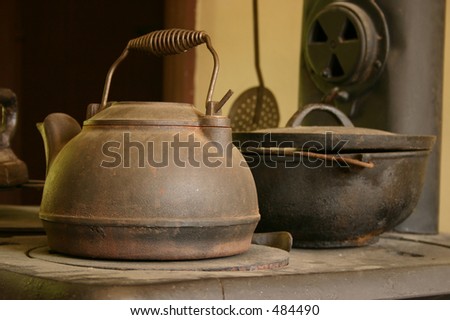 Old kettle on an oven