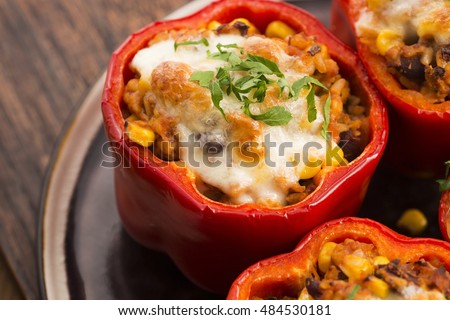 Stuffed peppers with meat, kidney beans and corn Royalty-Free Stock Photo #484530181