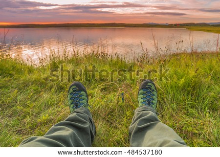 Hiking boots and tundra sunset at Iceland, summer time, 2016