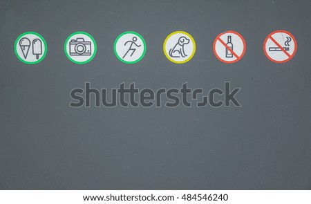 signs for pedestrians in a park on a gray background