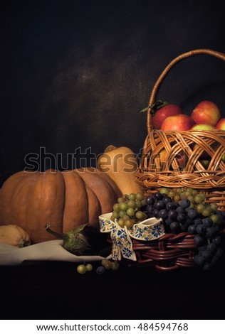 Still life with grapes and pumpkin