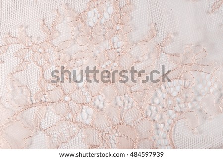 Brown lace texture background. Closeup