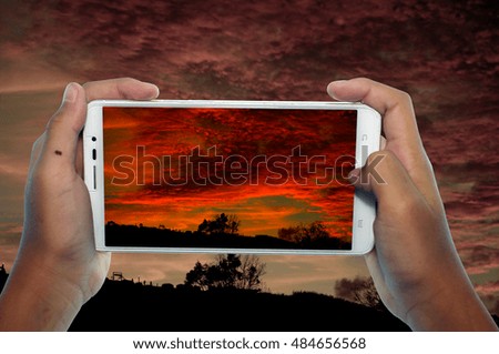 smartphone with taking pictures the landscape on mountain at Thailand