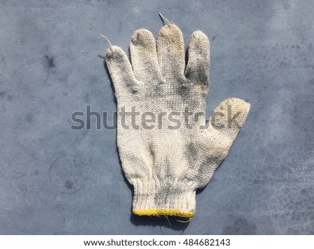 White glove on gray background