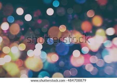 Christmas wallpaper decorations concept.Sparkle circle lit   celebrations display.colored abstract blurred light   background layout design.Festive elegant abstract   background