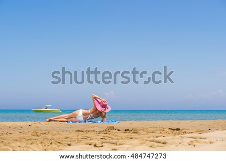 Young fashion woman relax on the beach