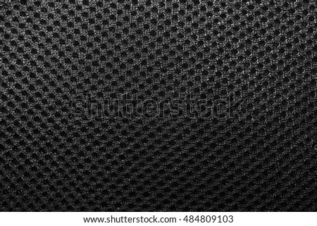 Polyester texture. The breathable material. The holes for air. The back of the backpack Royalty-Free Stock Photo #484809103