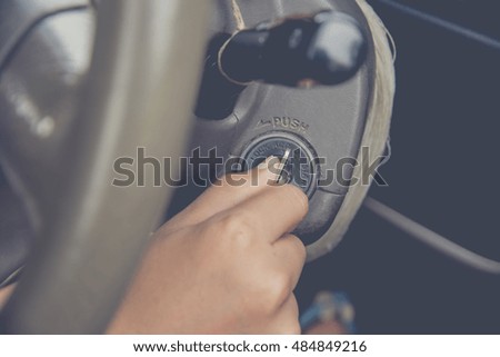 Hand rotate key to starting the car, picture vintage style