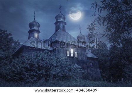 Old European church in a full moon night