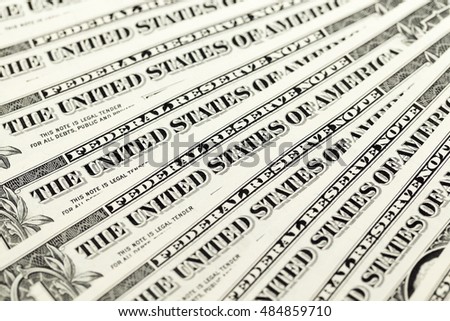   photographed close-up American dollars, small depth of field, the cost of one dollar banknote,