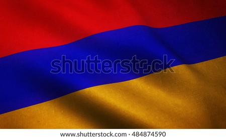 Realistic flag of Armenia waving with highly detailed fabric texture.,
