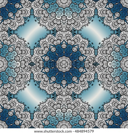 Oriental seamless pattern of white flowers and mandalas. Vector blue round background.