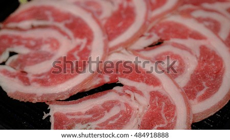 Pork sliced on dish, close-up. Selective focus. defocused