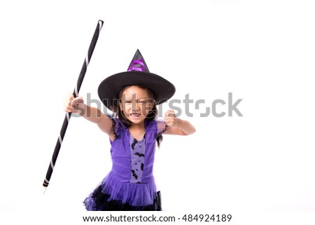 Little witch girl costume posing for halloween isolated on white background,Halloween costume girl posing isolated on white background