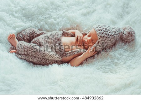 cute newborn child lying asleep