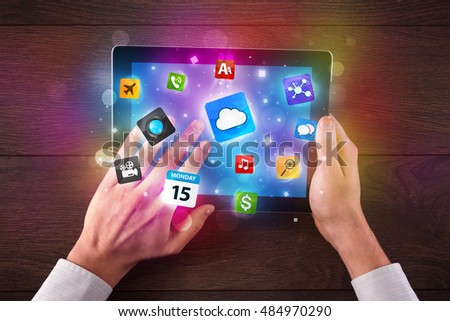 Caucasian business hands holding and working on tablet