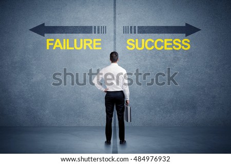 Businessman standing in front of success and failure arrow concept on grungy background