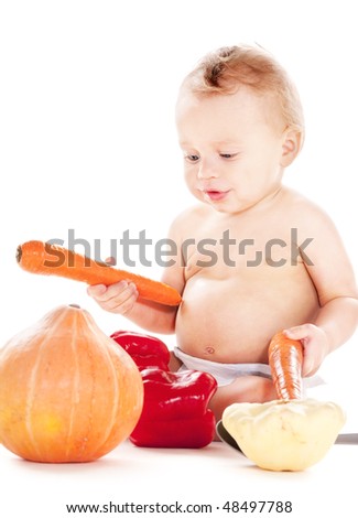 picture of baby boy in diaper with vegetables