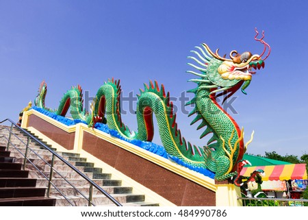 Dragon sculpture on railing