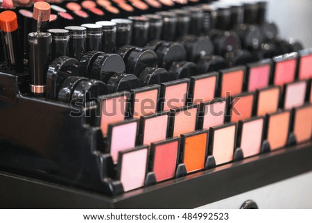 Eye shadow, blush, powder of different colors. Women's cosmetics. Sets.