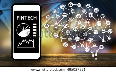 Fintech Investment concept. Smartphone ,  application , brain connect icons of technology and financial , blurred banknote and abstract background on wood table