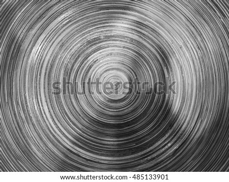 Spiral wooden texture on wall. Abstract background in dark tone.