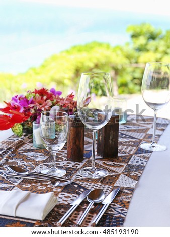 table in the restaurant on the sea background