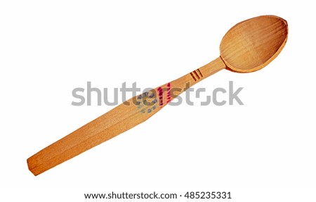A handmade Romanian wooden spoon, isolated on white background