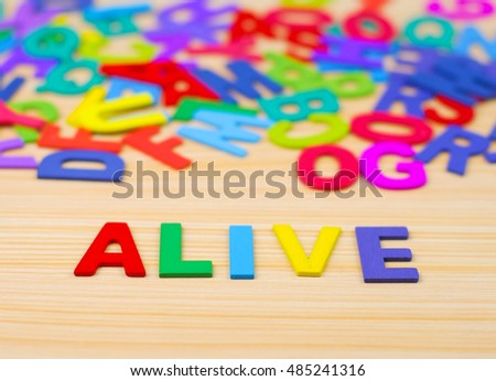 Colorful alphabet with word alive