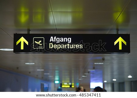 Departures sign at an airport