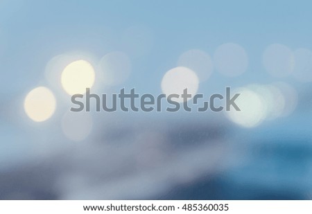 Defocused winter city night filtered bokeh abstract background

