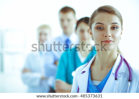 Woman doctor standing with stethoscope at hospital