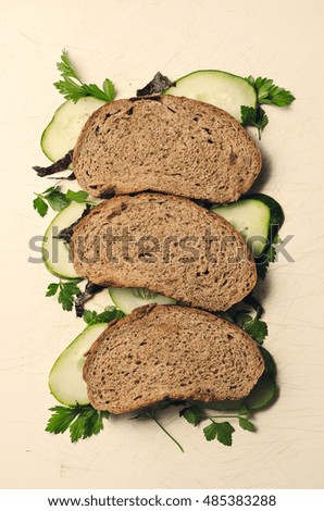 Bakery product. Tasty rye bread with vegetables. 