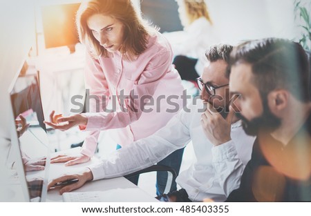 Coworkers Business Meeting Process Sunny Modern Office.Teamwork Concept.Group Young People Discussing Together Startup Idea.Businessman Team Working Online Project Desktop.Blurred Background