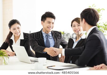 business people shaking hands during meeting Royalty-Free Stock Photo #485405566