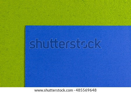 Eva foam ethylene vinyl acetate blue surface on apple green sponge plush background