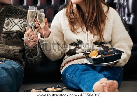 Couple toasting each other