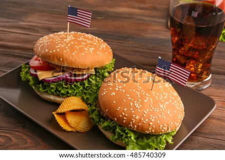Hamburgers on wooden background