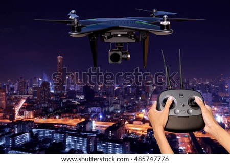 Drone Flying over  city. Blurred background.