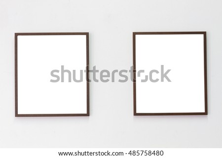 horizontal photo of two photo frame on blank wall background, copyspace.