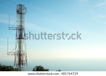 Cellular communication tower in blue sky background