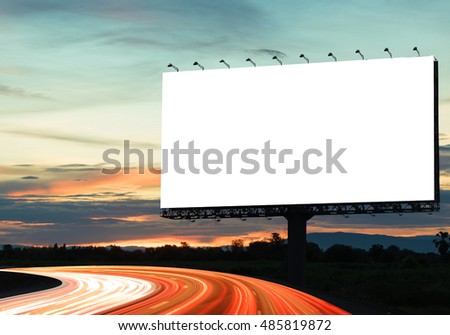 Blank template  for outdoor advertising or blank billboard on the highway during the twilight. With clipping path on screen - can be used for trade shows, and advertising or promotional poster.